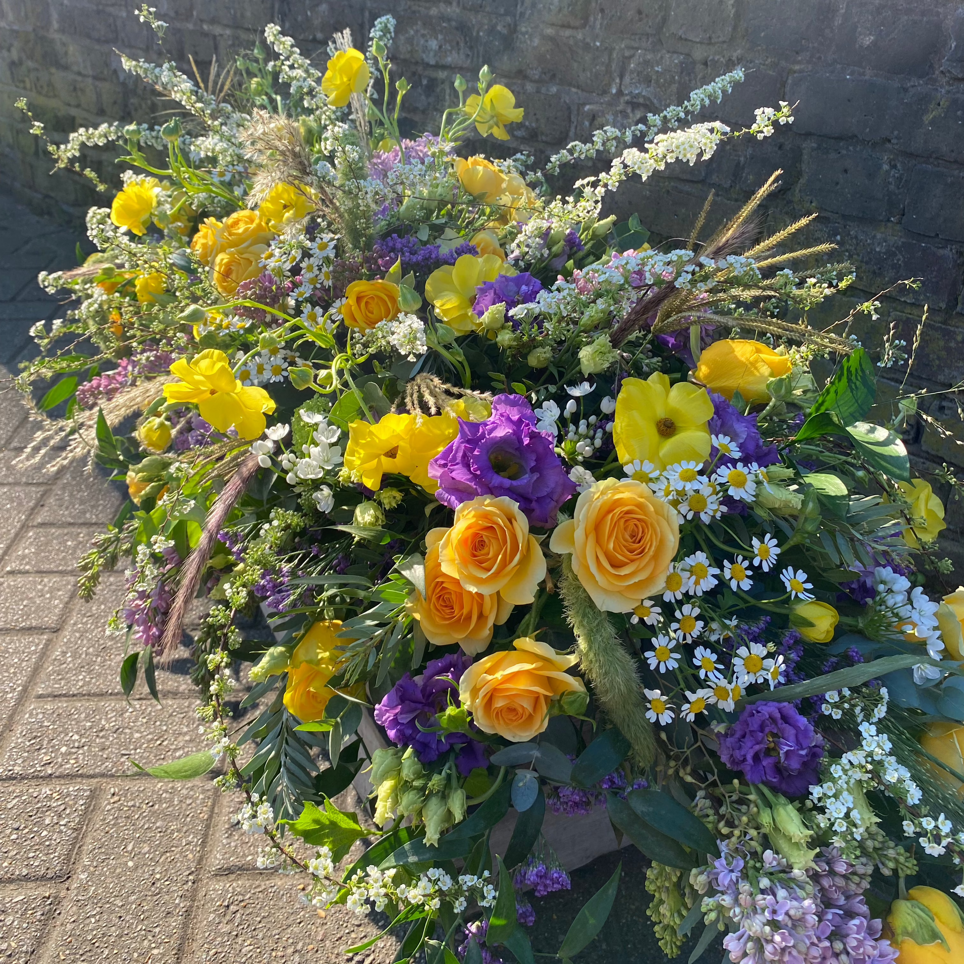 Country Style Flowers for a Funeral delivered in Winchmore Hill